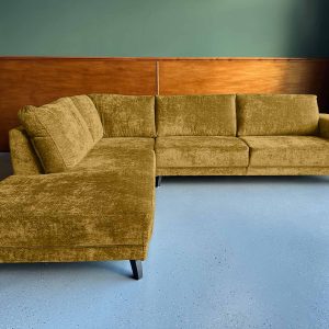 Fel groene hoekbank links Boucle Teddy stof Panto Green Groningen