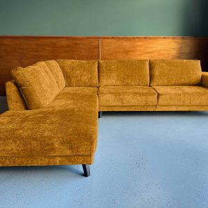 Teddystof Boucle ruime bank Earth Yellow links fel gele hoekbank Friesland