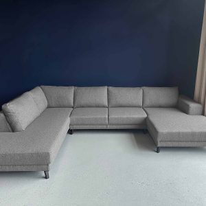 Grote grijze U hoekbank Grijze geweven stof Sonic Grey links 1